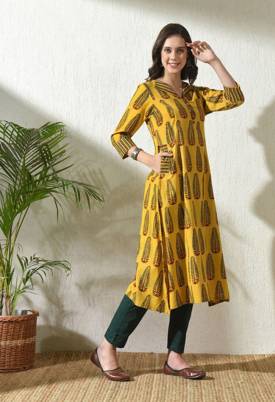 Woman in a mustard yellow printed cotton kurta